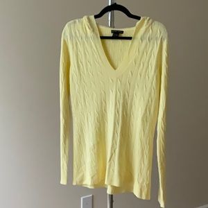 Yellow light weight hooded sweater from New York and Company.